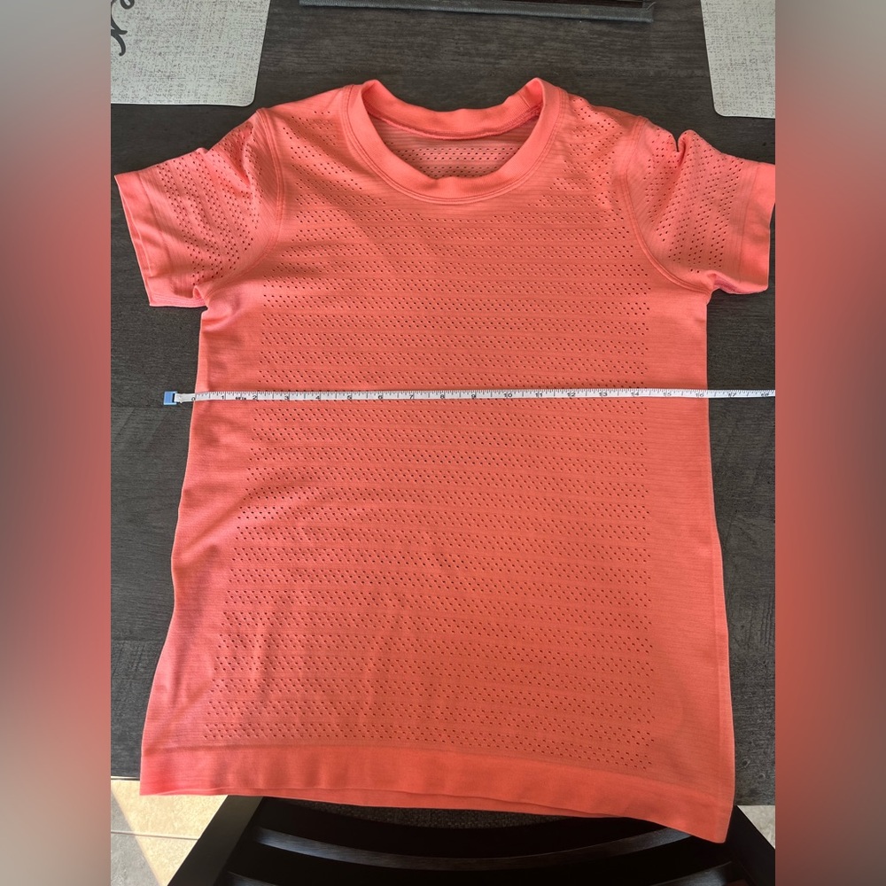 lululemon athletica Coral Perforated Short Sleeve Top